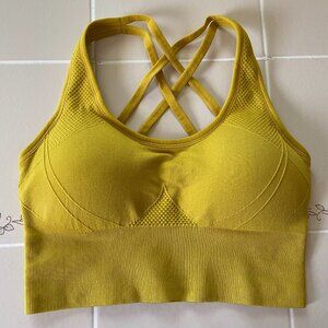 NWOT Velocity padded sports bra. Firm support, size Small. Yellow mustard color.